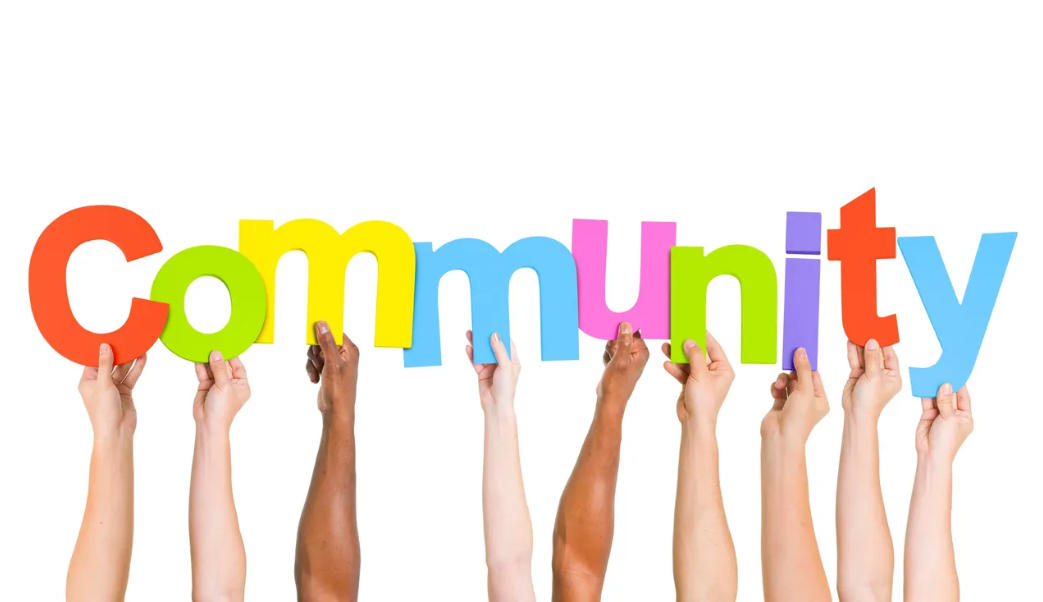 hands holding up community letters Community participation MasRic Health Registered NDIS Service Provider in Geelong and Surf Coast