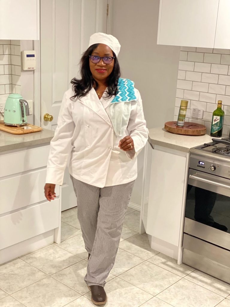 Masego in her kitchen wearing a chef's outfit Meal Preparation MasRic Health Registered NDIS Service Provider in Geelong and Surf Coast